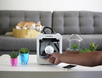 toybox 3d printer in use with cat